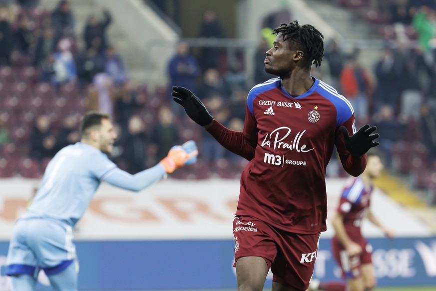 Servette&#039;s forward Chris Bedia celebrates his goal after scoring the 2:1, during the Super League soccer match of Swiss Championship between Servette FC and Grasshopper Club Zuerich, at the Stade ...