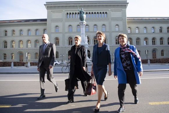 epa08298438 (L-R) Swiss Federal councillors Alain Berset, Karin Keller-Sutter, Swiss Federal president Simonetta Sommaruga, Swiss Federal councillor Viola Amherd arrive to brief the media about the la ...