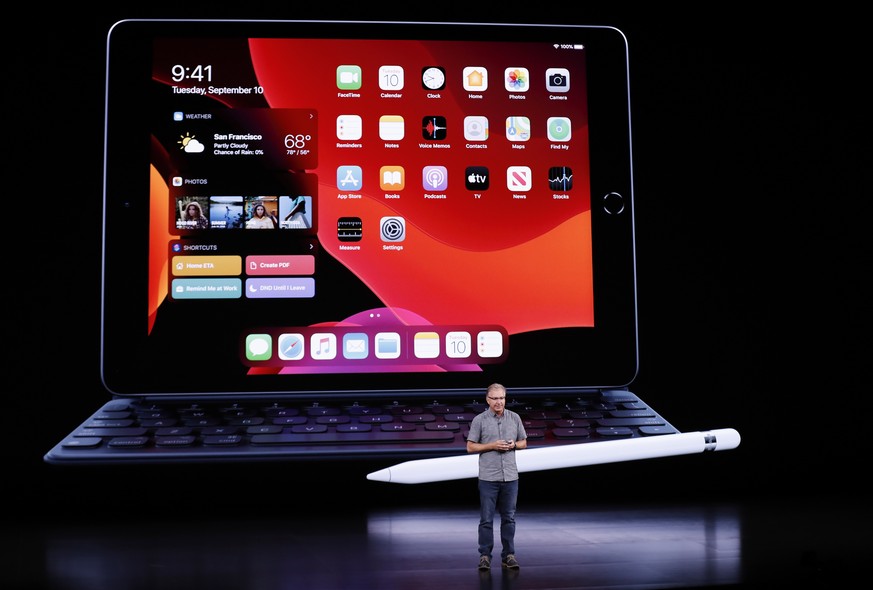 epa07833015 Apple Vice President of worldwide iPod, iPhone, and iOS product marketing Greg Joswiak speaks during the Apple Special Event in the Steve Jobs Theater at Apple Park in Cupertino, Californi ...