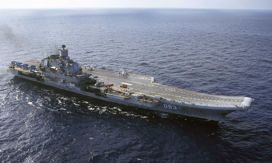 FILE - This 2004 file photo shows the Admiral Kuznetsov aircraft carrier in the Barents Sea, Russia. A Russian official says one person is missing and four have been injured in an accident that damage ...