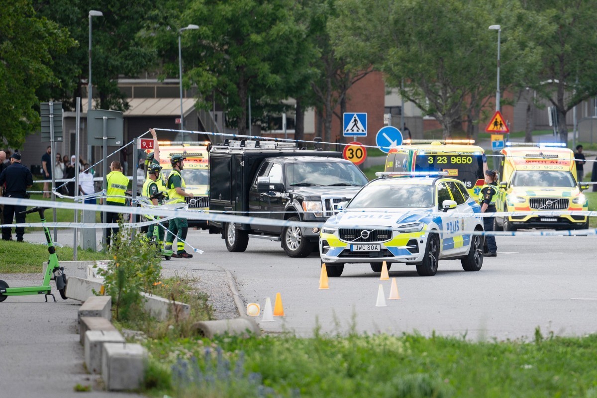 Police work at the scene outside a mosque in Orebro after a shooting where several people injured in Orebro, Sweden on August 15, 2025. Two people were wounded on August 15, 2025 in a shooting near a  ...