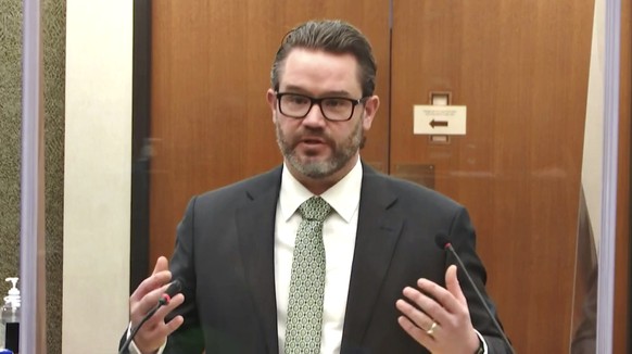 In this image taken from video, defense attorney Eric Nelson, questions witness Minneapolis Police Chief Medaria Arradondo as Hennepin County Judge Peter