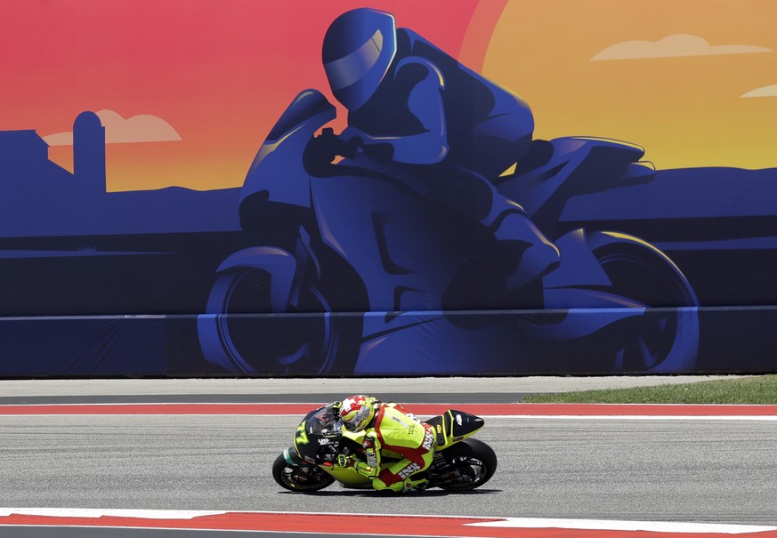 Moto 2 rider Dominique Aegerter, of Switzerland, rides into a turn during a motorcycle race at the Circuit Of The Americas in Austin, Texas, Sunday, April 22, 2018. (AP Photo/Eric Gay)