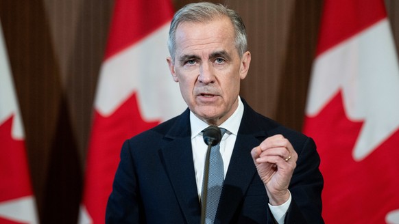 epa11992893 Canadian Prime Minister Mark Carney speaks during a press conference on proposed US tariffs on Parliament Hill in Ottawa, Canada, 27 March 2025. EPA/SPENCER COLBY