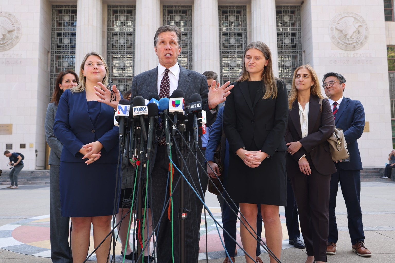 epa12849907 Attorney for Kayle GM, Mark Lanier (C) speaks to the media after a jury found Meta and YouTube liable in the social media addiction trial outside the Los Angeles Superior Court, in Los Ang ...