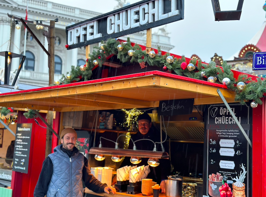 Weihnachtsmarktverkäufer in Luzern und Zürich.
