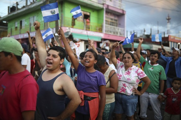 Central American migrants traveling with the annual Stations of the Cross caravan march to call for migrants&#039; rights and protest the policies of U.S. President Donald Trump and Honduran President ...