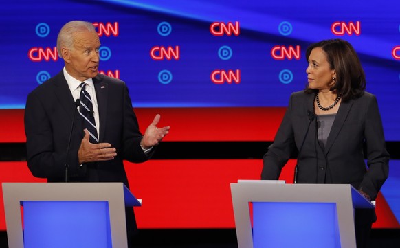 FILE - In this July 31, 2019, file photo, then-Democratic presidential candidate Sen. Kamala Harris, D-Calif., listens as Democratic presidential candidate former Vice President Joe Biden speaks durin ...