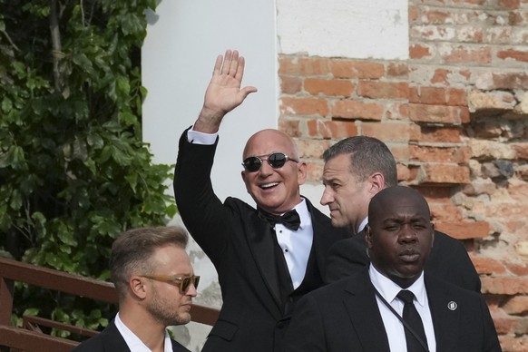 Jeff Bezos waves as he arrives at San Giorgio island ahead of the anticipated wedding celebrations with Lauren Sanchez, in Venice, Italy, Friday, June 27, 2025. (AP Photo/Antonio Calanni)
Jeff Bezos