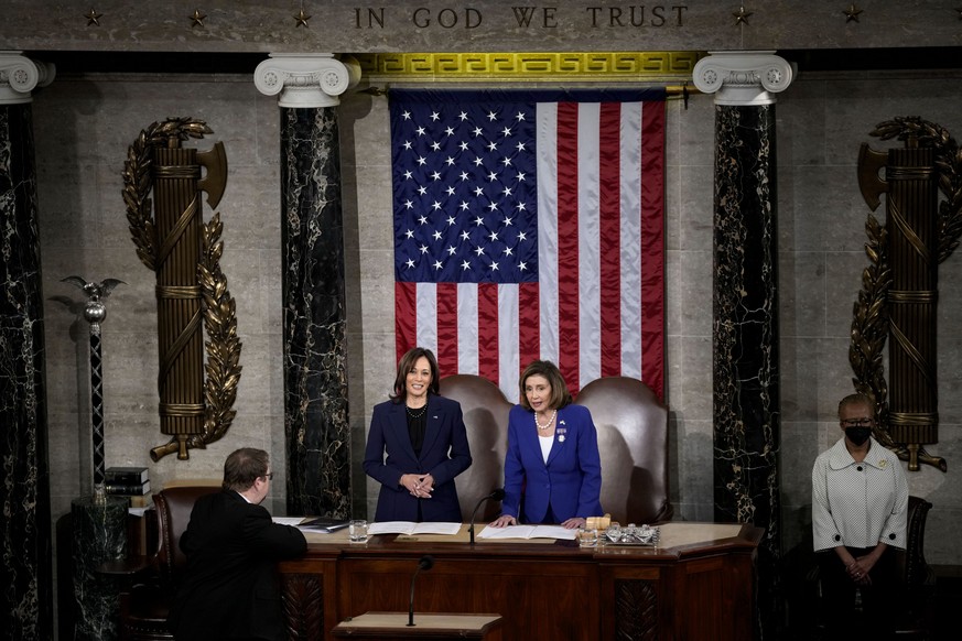 Vice President Kamala Harris and Speaker of the House Nancy Pelosi of California arrive before Ukrainian President Volodymyr Zelenskyy addresses Congress at the Capitol in Washington, Wednesday, Dec. 12.  21, 2022. ...