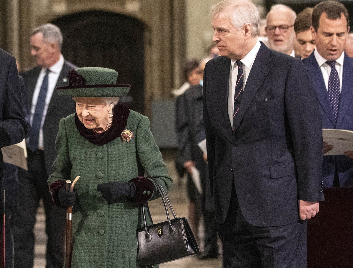 Britain's Queen Elizabeth II and Prince Andrew, center right, arrive for a Service of Thanksgiving for the life of Prince Philip, Duke of Edinburgh, at Westminster Abbey in London, Tuesday, March ...
