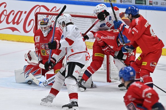 L-R goalkeeper Karel Vejmelka CZE receiving a goal, Sandro Schmid SUI, Dario Rohrbach SUI, Libor Hajek CZE and Michal Kovarcik CZE in action during the Czech Hockey Games, part of the Euro Hockey Tour ...