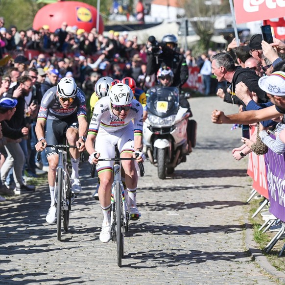 Slovenian Tadej Pogacar of UAE Team Emirates pictured with the attack at Oude Kwaremont during the men s race of the Ronde van Vlaanderen/ Tour des Flandres/ Tour of Flanders one day cycling race, 268 ...