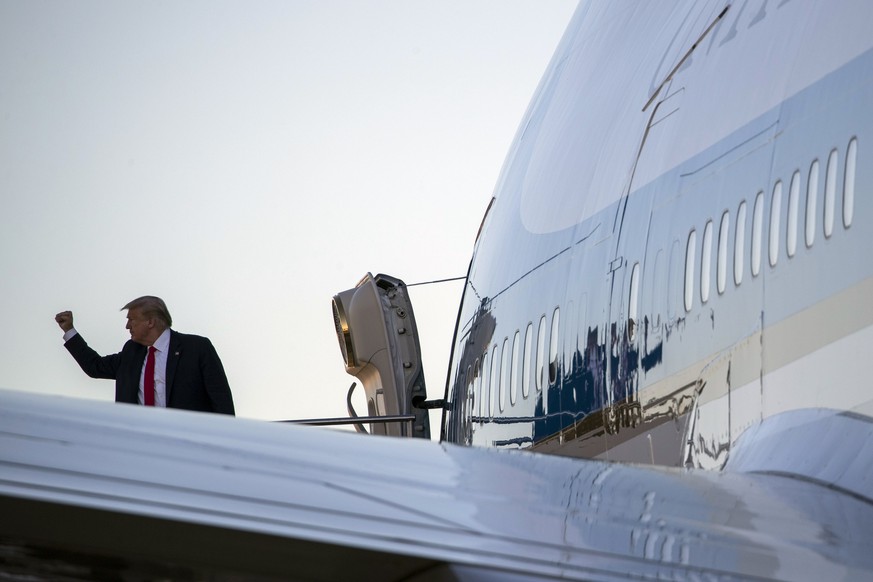 President Donald Trump pumps his fist as he boards Air Force One at Dallas Love Field, Thursday, June 11, 2020, in Dallas.(AP Photo/Alex Brandon)
Donald Trump