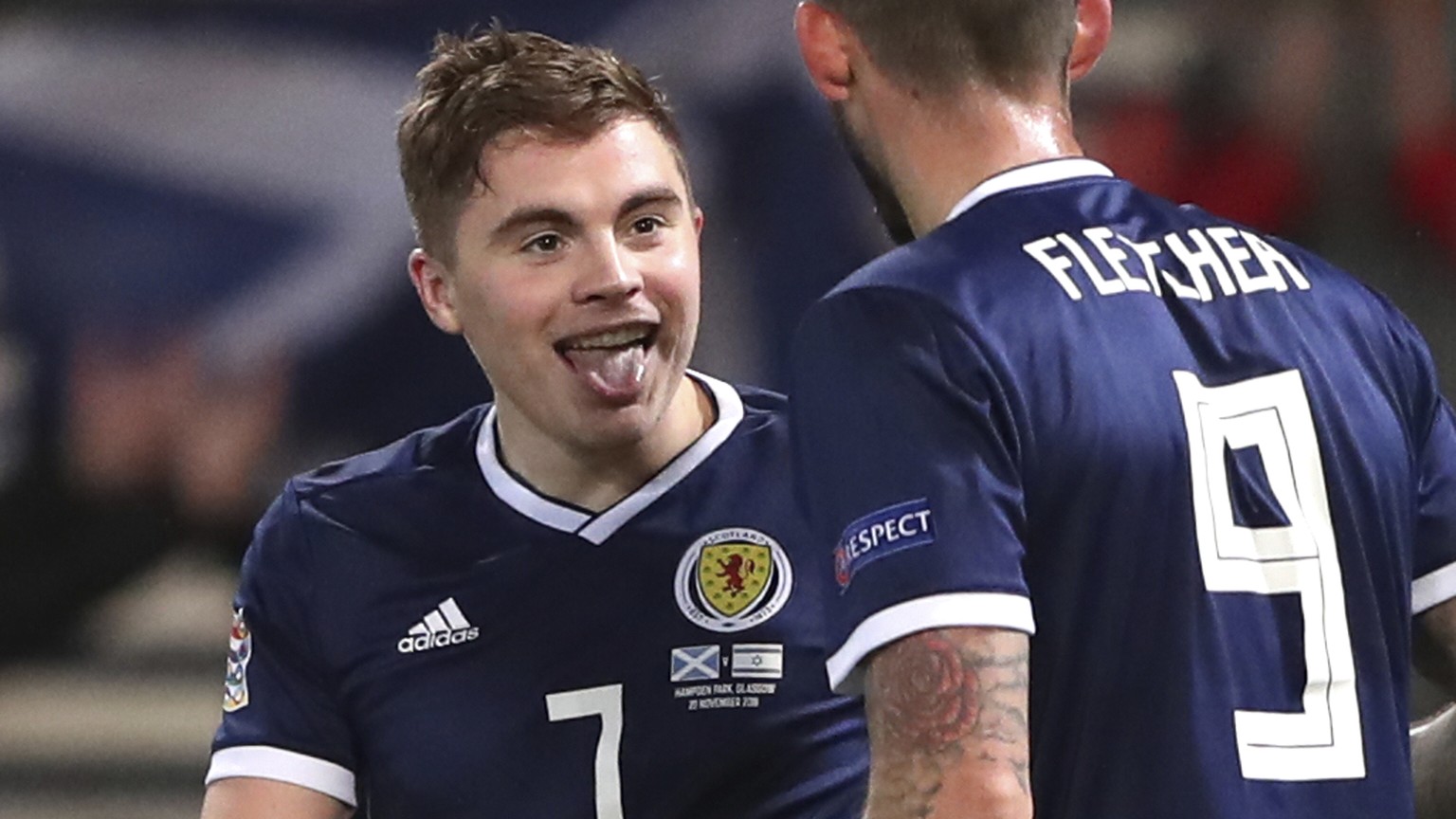 Scotland&#039;s James Forrest, left, reacts with his teammate Steven Fletcher after scoring his side&#039;s third goal during the UEFA Nations League soccer match between Scotland and Israel at Hampde ...