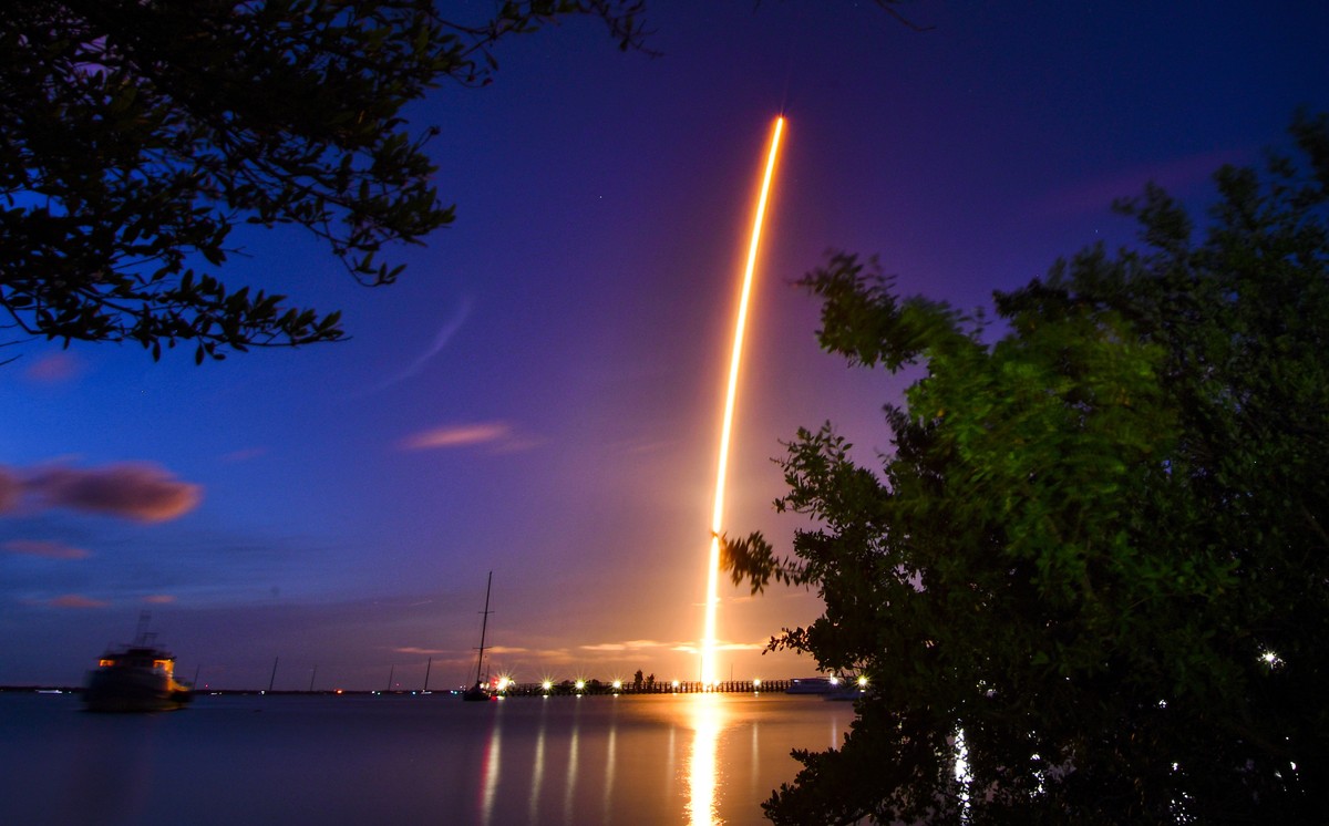 The launch of a SpaceX Crew Dragon capsule atop a Falcon 9 rocket is seen after taking off from Pad 39A at Kennedy Space Center in Cape Canaveral, Fla., late Wednesday, Sept. 15, 2021, with an all-ama ...