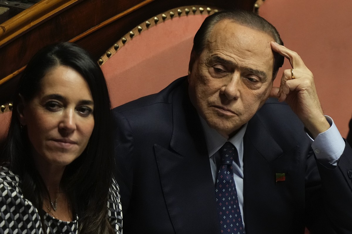 Forza Italia party leader Silvio Berlusconi, rights waits to deliver his address ahead of a confidence vote at he Senate for the new Government, in Rome, Wednesday, Oct. 26, 2022. (AP Photo/Andrew Med ...