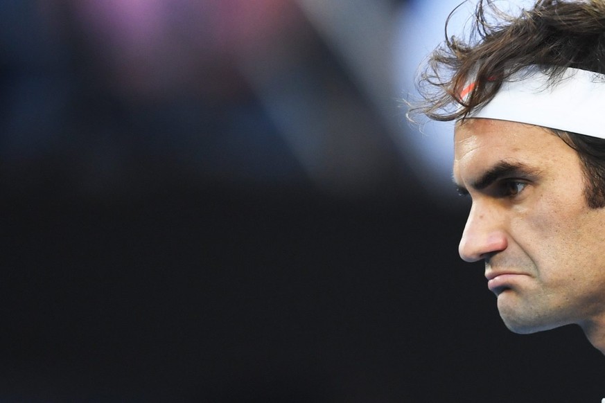 epa05751335 Roger Federer of Switzerland reacts during his Men's Singles semifinal match against Stan Wawrinka of Switzerland at the Australian Open Grand Slam tennis tournament in Melbourne, Australi ...