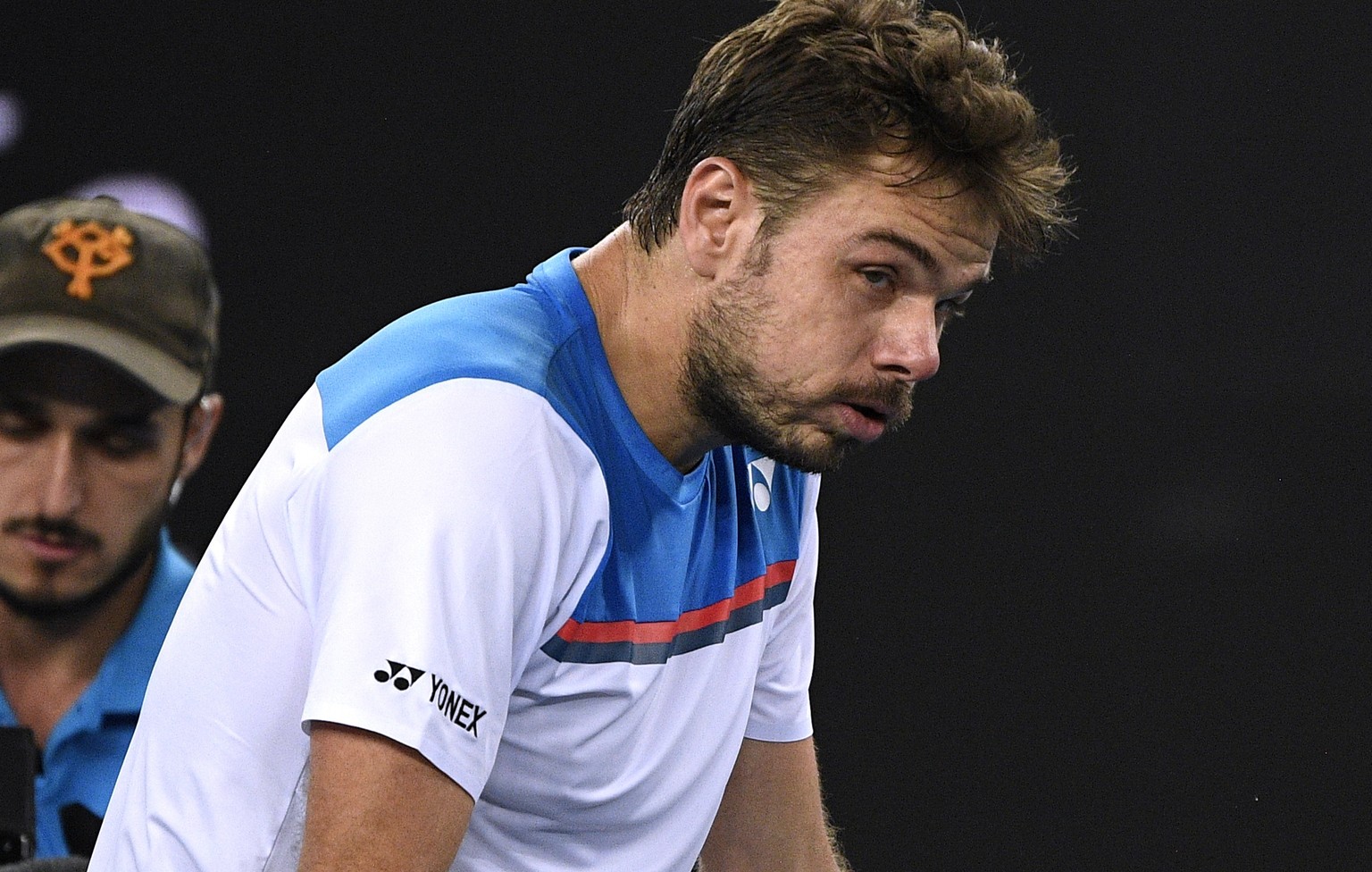 Switzerland&#039;s Stan Wawrinka rests on the net after defeating Italy&#039;s Andreas Seppi in their second round singles match at the Australian Open tennis championship in Melbourne, Australia, Thu ...