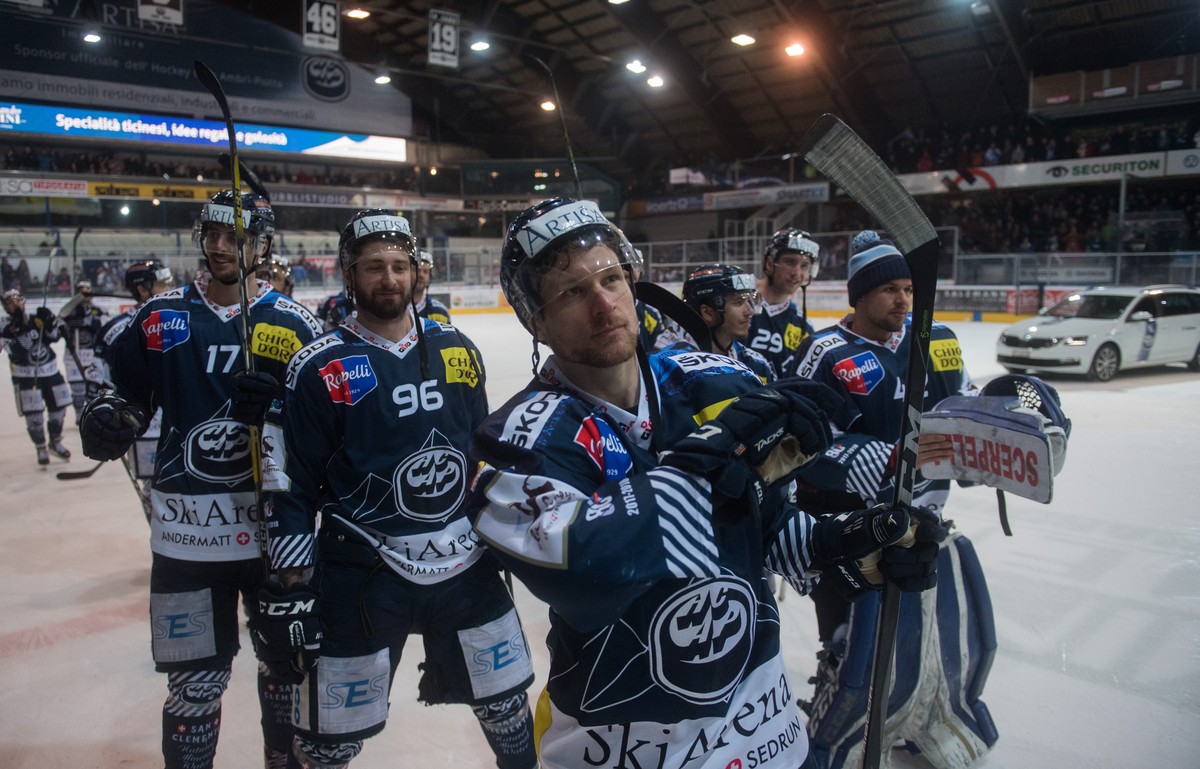 Ambri's players celebrate after the 2-1 victory, during the fifth match of the playout final of the National League Swiss Championship between HC Ambri-Piotta and EHC Kloten, at the ice stadium V ...