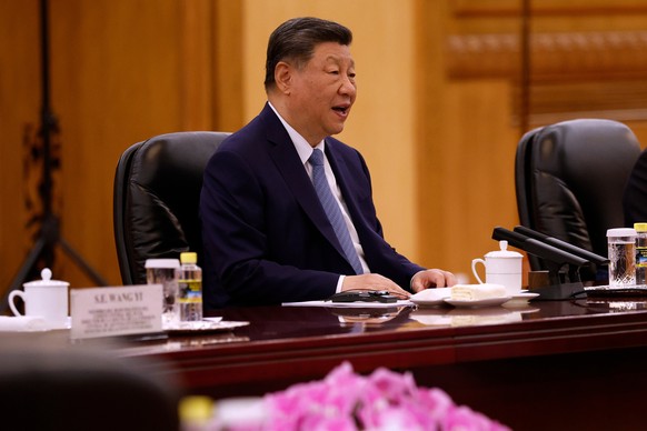 China's President Xi Jinping attends a meeting with Spain's Prime Minister Pedro Sanchez, third right, at the Great Hall of the People in Beijing Tuesday, April 14, 2026. (Haruna Furuhashi/P ...