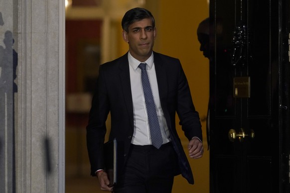 British Prime Minister Rishi Sunak walks out to address the media at Downing Street in London, Friday, March 1, 2023. The Prime Minister used the speech to warn that democracy is being targeted...