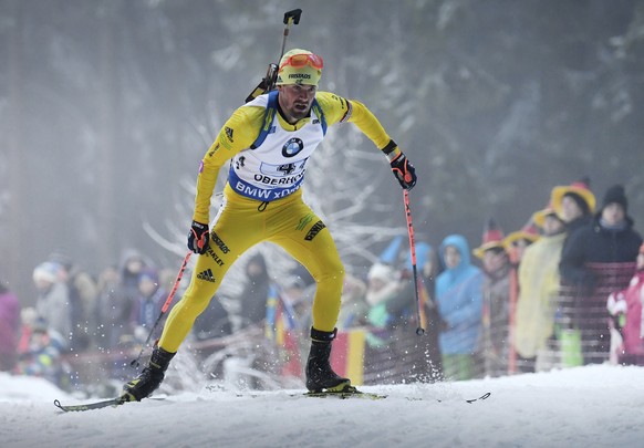 Sweden's Fredrik Lindstroem on the track during the men's 4x7.5km relay event of the Biathlon World Cup in the DKB'Ski Arena in Oberhof, Germany, Sunday, Jan. 7, 2018. (Hendrik Schmidt/dpa via AP)