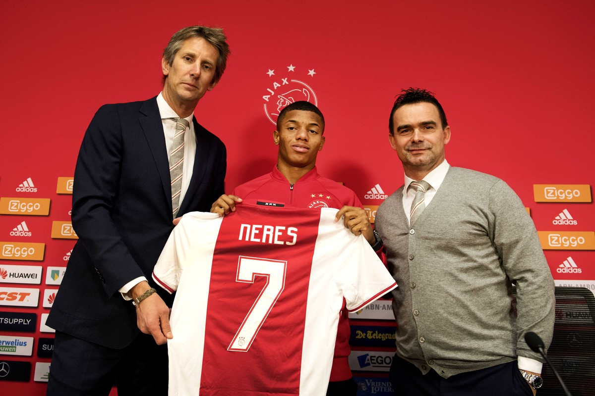 epa05800031 General director Edwin van der Sar (L) and Director of football Marc Overmars (R) present Ajax Amsterdam's new player David Neres Campos (C) in Amsterdam, The Netherlands, 17 February ...