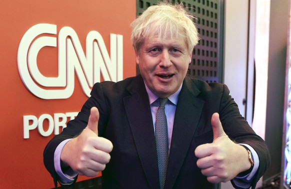 epa10319026 Former British Prime Minister, Boris Johnson, attends the 1st CNN Portugal International Summit under the theme 'Embrace the future: The world as we want it to be' in Lisbon, Portugal, 21  ...
