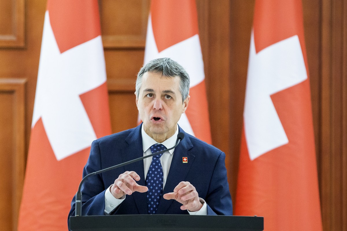 epa09841889 Swiss President Ignazio Cassis gestures at a joint press conference with Moldova's President Maia Sandu (not pictured), during his official visit at Presidential Palace in Chisinau, M ...