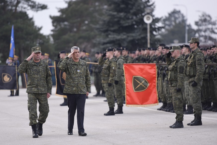 epa07228847 President of the Republic of Kosovo Hashim Thaci (C) inspects Members of the Kosovo Security Force (KSF) in Pristina, Kosovo, 13 December 2018. The 120 seat parliament of the Republic of K ...