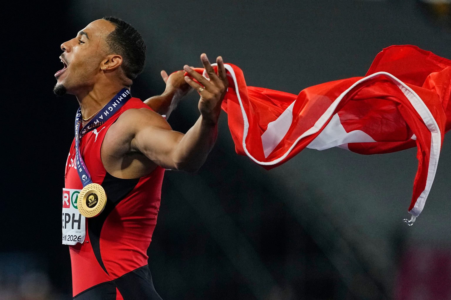 Switzerland's Jason Joseph celebrates after winning the men's 110 meters hurdles final at the European Athletics Championships in Birmingham, England, Wednesday, Aug. 12, 2026. (AP Photo/Pet ...