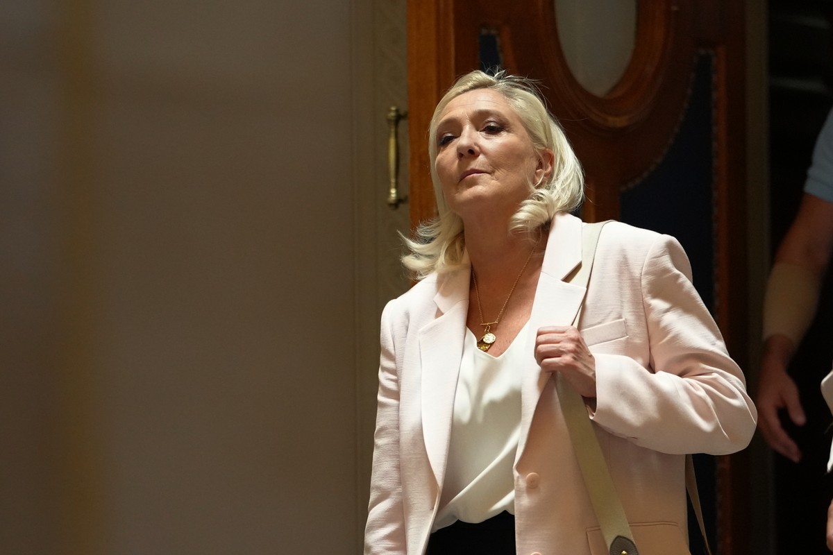 Far-right leader Marine Le Pen leaves the courtroom after the verdict of her appeal trial, in Paris, France, Tuesday, July. 7, 2026. (AP Photo/Aurelien Morissard)
France Le Pen Trial