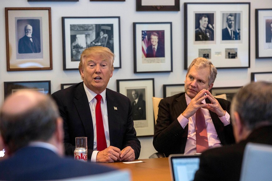 President-elect Donald Trump, left, and New York Times Publisher Arthur Sulzberger Jr., right, appear during a meeting with editors and reporters at The New York Times building, Tuesday, Nov. 22, 2016 ...