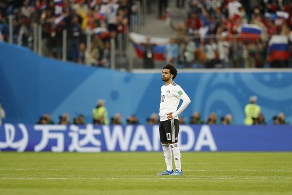 Egypt's Mohamed Salah reacts after Russia's team scored second goal during the group A match between Russia and Egypt at the 2018 soccer World Cup in the St. Petersburg stadium in St. Peters ...