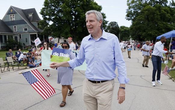 FILE - In this July 4, 2019, file photo, Democratic presidential candidate New York Mayor Bill de Blasio walks in the Independence Fourth of July parade in Independence, Iowa. de Blasio said Friday, S ...