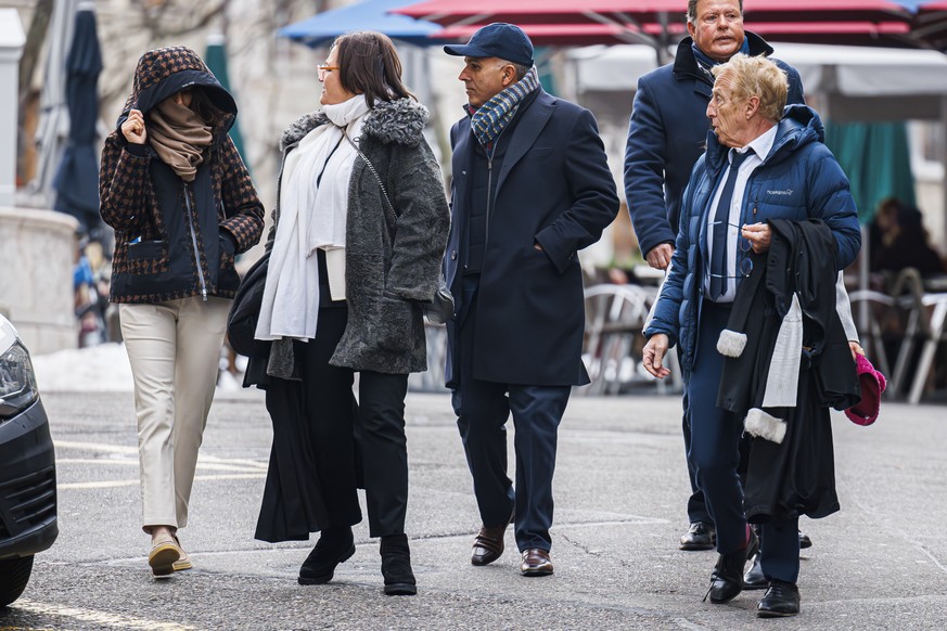 epa11078855 Yael Hayat (L) and Robert Assael (R), lawyers of the accused, arrive at the court house with their clients Ajay Hinduja (2-R) and his wife Namrata (2-L) of the Hinduja Indian billionaire f ...