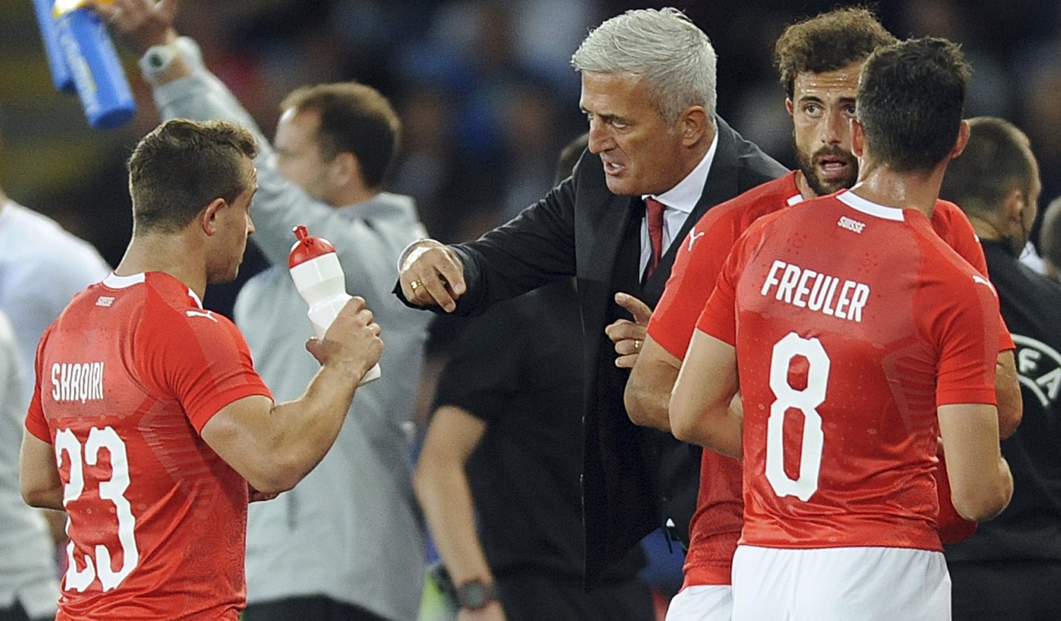 Switzerland team manager Vladimir Petkovic speaks to Switzerland&#039;s Xherdan Shaqiri , left,during the International friendly soccer match between England and Switzerland at the King Power Stadium  ...