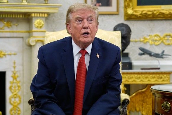 President Donald Trump speaks as he meets with lifeguard Ryder Williams in the Oval Office of the White House, Monday, Aug. 17, 2026, in Washington. (AP Photo/Manuel Balce Ceneta)
Donald Trump