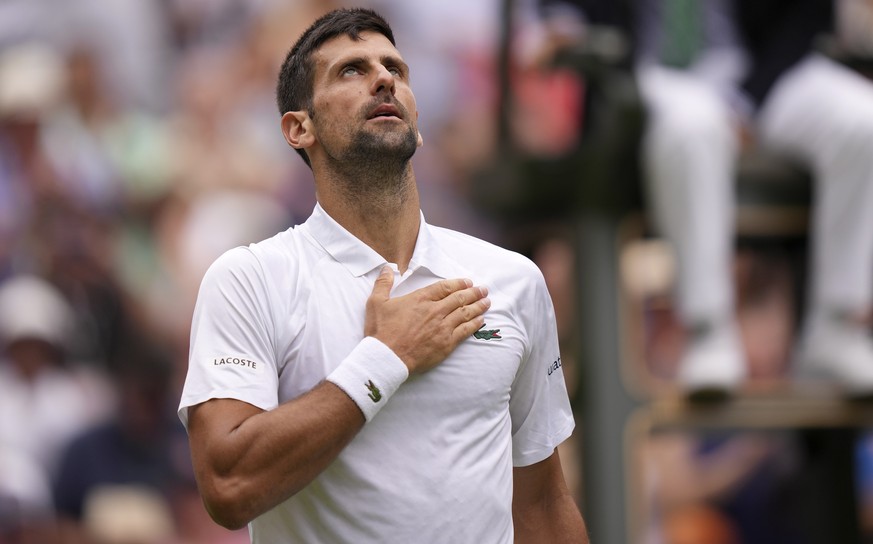 Serbia&#039;s Novak Djokovic reacts after beating Poland&#039;s Hubert Hurkacz in a men&#039;s singles match on day eight of the Wimbledon tennis championships in London, Monday, July 10, 2023. (AP Ph ...