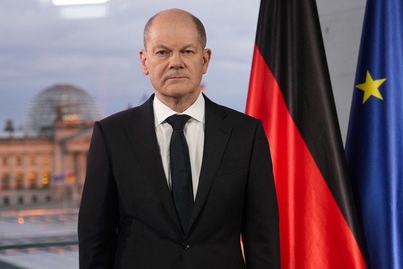 German Chancellor Olaf Scholz poses for media after the recording of a television speech at the chancellery in Berlin, Germany, Thursday, Feb. 24, 2022, following the Russian attack of Ukraine.(AP Pho ...