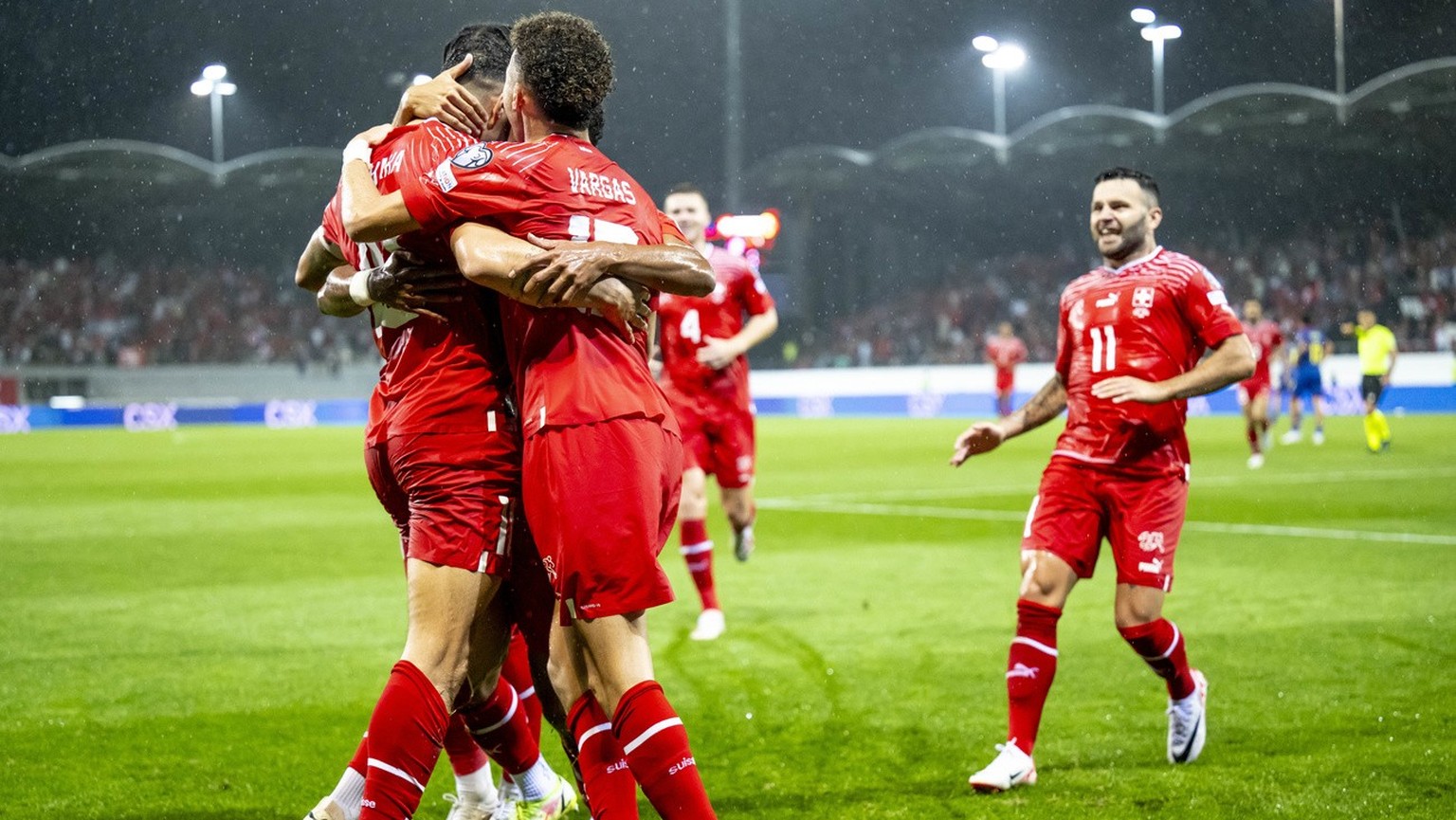 Switzerland&#039;s midfielder Granit Xhaka, left, celebrates the 2-0 goal with teammates Ruben Vargas, second from left, and Renato Steffen, right, during the UEFA Euro 2024 qualifying group I soccer  ...