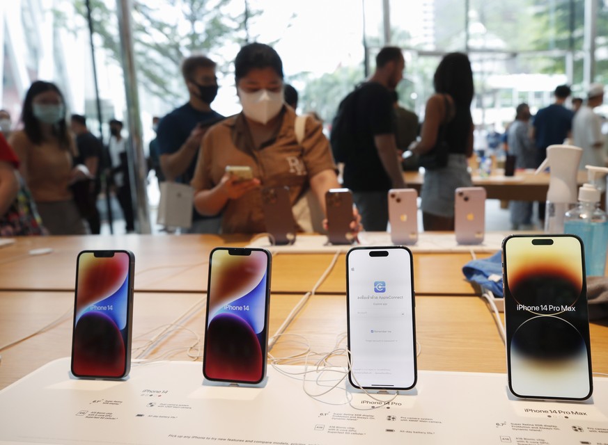 epa10187545 A crowded Apple Store as people flock to purchase the new iPhone 14 in Bangkok, Thailand, 16 September 2022. According to the International Data Corporation (IDC), a global market research ...