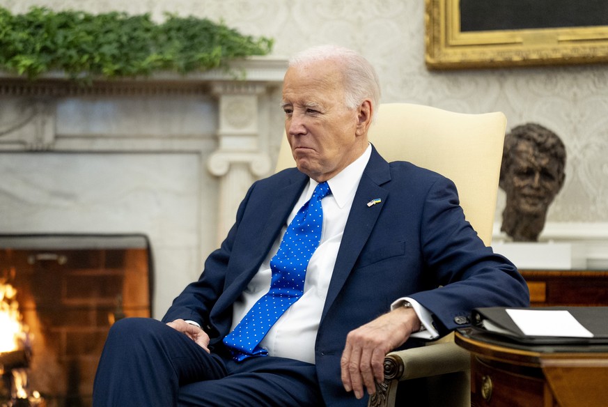 FILE - President Joe Biden sits in the Oval Office of the White House, Friday, Feb. 9, 2024, in Washington. Biden&#039;s team hopes it has found an unlikely opportunity to go on offense, and perhaps t ...