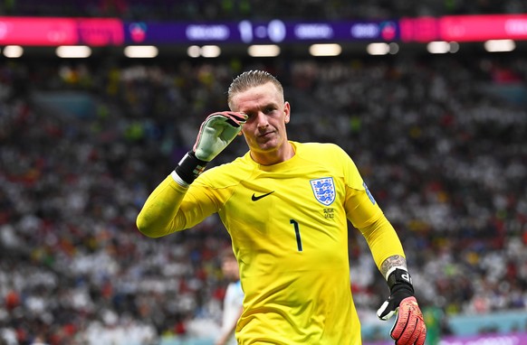 epa10348656 England goalkeeper Jordan Pickford reacts during the FIFA World Cup 2022 round of 16 soccer match between England and Senegal at Al Bayt Stadium in Al Khor, Qatar, 04 December 2022. EPA/Ne ...