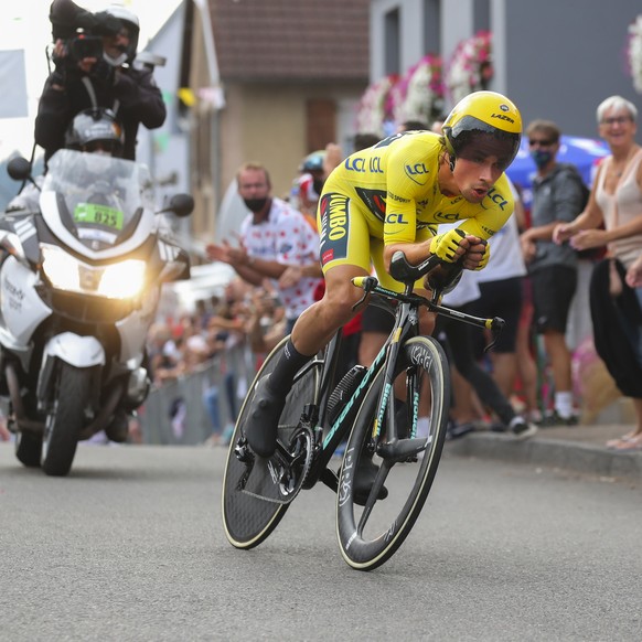 Slovenia&#039;s Primoz Roglic, wearing the overall leader&#039;s yellow jersey, competes during stage 20 of the Tour de France cycling race, an individual time trial over 36.2 kilometers (22.5 miles), ...