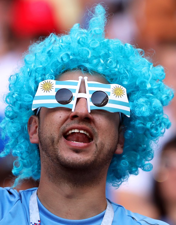 epa06824675 A supporter of Uruguay cheers for his team prior to the FIFA World Cup 2018 group A preliminary round soccer match between Uruguay and Saudi Arabia in Rostov-On-Don, Russia, 20 June 2018.
 ...