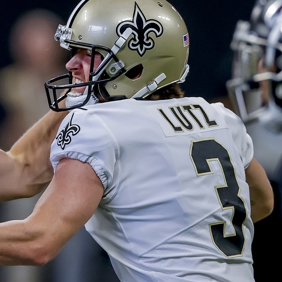 epa10178694 New Orleans Saints place kicker Wil Lutz (R) reacts with Saints punter Blake Gillikin (L) after Lutz kicked the game-winning field goal during the second half of a NFL American football ga ...