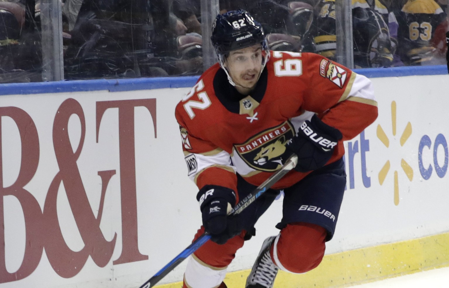 Florida Panthers&#039; Denis Malgin (62) skates with the puck as Boston Bruins&#039; Riley Nash (20) defends during the first period of an NHL hockey game, Thursday, March 15, 2018, in Sunrise, Fla. ( ...