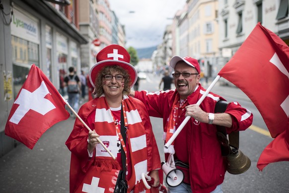 Swiss fans react during the UEFA EURO 2016 group A preliminary round soccer match between Albania and Switzerland, at a public viewing in Zurich, Switzerland, Saturday, June 11, 2016. (KEYSTONE/Ennio Leanza)